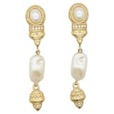 Givenchy Vintage 1980s Baroque Irregular White Pearls Crystals Relief Dangle Drop Clip Earrings, Gold Plated Very excellent condition and very unique. 100% Genuine. Givenchy Signed clearly on the reverse. Very rare to find. Material: Gold plated metal, Faux Pearls, Rhinestones. Size: 7.0*1.5 cm. Weight: 12 g/each. _ _ _ Great for everyday wear. Come with velvet pouch and beautiful package. Makes the perfect gift for Teens, Sisters, Friends, Girlfriends, Birthdays, Anniversaries, Mother’s Day, Valentine’s Day, Christmas and many more. With exquisite fine detail, these fashion jewellery are ideal for a glamorous look. Ideal for a splendid gift or an eye-catching jewellery for your everyday outfit. Also don't forget to look through my other listings, I have so many more beautiful jewellery wa Earring Video, Vintage Drop Earrings, Velvet Pouch, Everyday Outfit, Clip Earrings, Fashion Jewellery, Vintage Jewellery, San Valentino, Gifts For Teens