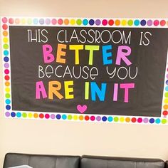 this classroom is better because you are in it sign on the wall above a couch