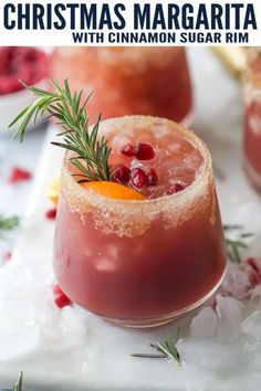 christmas margarita with cinnamon sugar rim and rosemary garnish