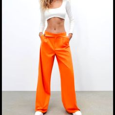 Love But These Are A Really Loose Billie Eilish Level Of Oversized...Im 5'9 So I Love That They Hit The Ground Even When I'm In Heels. Side Zipper.(Same Leg Cut As The First Zara Photo But They Zip Closed On The Side). I'm Waist 25/26 And They Could Easily Fit 26/27 Orange Pants With Pockets For Day Out, Orange Bottoms For Day Out In Fall, Orange Bottoms For Fall Day Out, Orange Baggy Bottoms For Spring, Baggy Wide Leg Pants For Day Out, Spring Orange Baggy Bottoms, Zara Orange Wide Leg Bottoms, Zara High Waist Orange Bottoms, Zara Orange Bottoms For Work