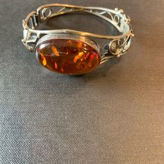 Elegant Estate Handcrafted Orange Garden Design Bracelet Bangle. Is An Original Sterling Unique Formal Gemstone Bangle, Unique Formal Bangle With Gemstone, Unique Gemstone Bangle For Formal Occasions, Silver Oval Cuff Bracelet With Polished Finish, Elegant Cabochon Bracelets For Anniversary, Formal Metal Bangle With Polished Finish, Formal Gemstone Cuff Bracelet In Bangle Shape, Formal Gemstone Bangle Cuff Bracelet, Elegant Oval Cuff Bracelet For Formal Occasions