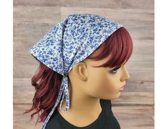 This beautiful blue floral no-slip kerchief is the perfect accessory to add your cottagecore wardrobe!  The no-slip design is carefully created to help the hair kerchief stay on your head.   This item is made as a single layer hair scarf.  Ties are about 15 inches for the large size and 14 inches for the petite. Perfect to wear when your hair is growing out and when you are working in the garden.  In a hurry?  Not to worry!  You can wear this minimalist headscarf and still be stylish! The floral print bandana is carefully handmade by me, with quality cotton fabric and matching thread. I make the matching bias tape ties myself.  The headscarf with ties has adjustability and will last a long time.   These headscarves are the perfect cottagecore gift for self, mom, sister or your bestie! Your Blue One Size Headscarf For Spring, Adjustable Blue Bohemian Headscarf, Adjustable Bohemian Blue Headscarf, Blue Head Scarf, Cottagecore Wardrobe, Hair Kerchief, Gift For Self, Kerchief Hair, Layer Hair