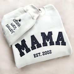 Custom Embroidered Mama Sweatshirt with Kids Names on Sleeve New Mom Hoodie Personalized Gift for Mom Crewneck Pullover ✨𝐇𝐨𝐰 𝐭𝐨 𝐎𝐫𝐝𝐞𝐫: Specify in the personalization Box: Mama can be changed to custom name/Text * Name:  * Date: * Kids names for the sleeve * Thread Color: * Glitter Color: ✨ 𝐃𝐞𝐭𝐚𝐢𝐥𝐬: * Unisex Fit * Weight around 8 Oz * 50/50 cotton/polyester * Heather is 60/40 polyester/cotton * Made with OEKO-TEX certified low-impact dyes ♥ Please note, print colors may very slig Winter Crew Sweatshirt With Letter Embroidery, Winter Crew Neck Hoodie With Embroidered Logo, Winter Embroidered Logo Crew Neck Hoodie, Winter Hoodie With Embroidered Logo And Crew Neck, Crew Hoodie With Letter Embroidery For Winter, Winter Crew Hoodie With Letter Embroidery, Fleece Hoodie Sweatshirt With Letter Embroidery, Fleece Hoodie Sweatshirt With Embroidered Graphics, Embroidered Fleece Hoodie Sweatshirt