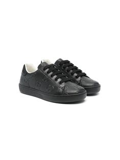 black leather perforated design signature embossed GG Supreme monogram round toe branded heel counter branded leather insole contrast lining flat rubber sole front lace-up fastening Gucci Low-top Sneakers With Leather Sole, Gucci Black Sneakers With Logo Print, Gucci Low-top Sneakers With Textured Sole, Gucci Black Low-top Sneakers, Luxury Low-top Gucci Sneakers, Gucci Kids, Kids Sneakers, Low Top, Boys Shoes