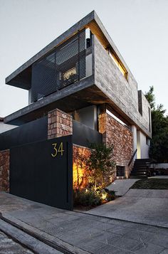 a modern house that has the number 54 on it