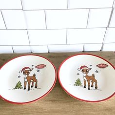 two christmas plates with reindeers on them