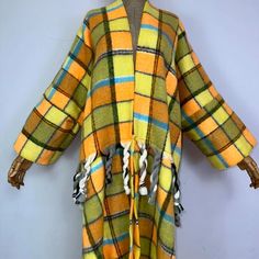 This super soft and warm wool cardigan kimono is perfect for the cold weather. Unlike other sweaters and wools, the wool used for this beauty is non itchy. Think of your favorite throw blanket, the comfort and warmth it gives but 10x stylish and wearable any where. This kimono is all that and more! One size fits S-4X Material: Wool One Size Fits Most Size Chart Multicolor Cardigan For Winter Loungewear, Multicolor Winter Cardigan For Loungewear, Cozy Lambswool Cardigan For Winter, Multicolor Shawl Cardigan For Winter, Oversized Plaid Cardigan For Winter, Oversized Plaid Winter Cardigan, Warm Wool Cozy Cardigan, Cozy Wool Cardigan, Warm Cozy Wool Cardigan