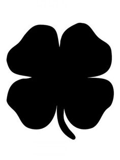 a four leaf clover silhouetted against a white background