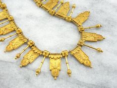 This Victorian Etruscan Revival gold necklace certainly falls under the category of 'Museum Piece'! During the Etruscan Revival period of the 1800's, jewelers and craftsmen sought to replicate the finely detailed gold work of the newly discovered ancient Etruscan artifacts. This is evident in this necklace: the quality of workmanship in the hollow-ware, filigree covered components is absolutely outstanding. Each piece slides individually on the original, woven chain. The condition is excellent, Statement Door, Etruscan Jewelry, Hand Jewellery, Bling Things, Ancient Jewels, Necklace Gothic, Woven Chain, Gothic Necklace, Fringe Necklace