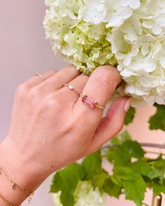 Anchored by classic prong settings, this ring is centered around a baguette-cut pink tourmaline stone that is believed to stimulate the heart chakra. The 18-karat gold band is decorated with petite diamond details for added shimmer. 18k yellow gold, pink tourmaline and diamond Carat: 0.03 ctw diamond, 0.87 ctw tourmaline Polish with soft cloth Made in Thailand | Yi Collection Women's Pink Tourmaline & Diamond Petite Circle Ring Size 4/4.5 Yi Collection, Circle Diamond Ring, Circle Diamond Rings, Soft Feminine, Circle Diamond, Circle Ring, Tourmaline Stone, Diamond Carat, Feminine Beauty