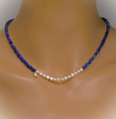 This choker is made with 5 mm. faceted blue lapis beads and adorn 6 mm. freshwater pearl beads.  A length is 16.25'' - 19.25'' ( 41 - 48.5 cm. ).  The necklace is ready to ship.  Thank you for visiting my shop. Blue Lapis Lazuli Pearl Necklace Gift, Blue Bead Necklace, Blue Stone Jewellery, Blue Stones Jewelry, Blue Turquoise Necklace, Gemstone Bar Necklace, Delicate Choker, Turquoise Choker, Gemstone Choker