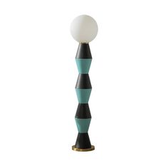 a tall black and blue lamp with a white ball on it's top, against a white background