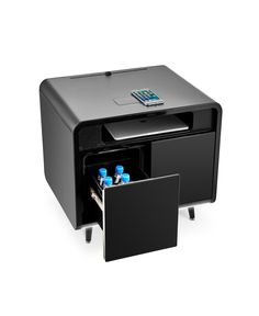 a black printer with two blue bottles in it's drawer and the lid open