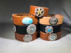 "Custom handmade leather wrist cuffs with different western style screw back conchos. Large fits wrists up to 7\" around with both snaps closed. Wrist cuff can go bigger or smaller by altering the snap combination. This measurement is approximate, and can vary slightly due to the thickness of the leather. Price included USPS shipping." Leather Wrist Cuff, Leather Key Fobs, Small Clutch, Leather Bracelets, Wristlet Clutch, Wrist Cuffs, Guitar Strap, Leather Key, Key Fobs