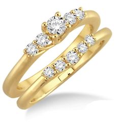 two gold wedding rings with diamonds