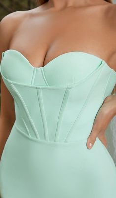 STRAPLESS CORSET MIDI DRESS IN SEAFOAM GREENDescription:The Strapless Corset Midi Dress in Seafoam Green is the perfect combination of sexy and edgy. The strapless, bandeau design creates a sleek and flattering silhouette, while the corset detailing adds a touch of edge to your style. Whether you're heading out for a night on the town or attending a special event, this dress is made for those who want to stand out from the crowd.Features: Strapless, bandeau design for a sleek and flattering silh Cocktail Midi Dress, Tube Midi Dress, Corset Midi Dress, Bandage Midi Dress, Strapless Corset, Strapless Bandeau, Midi Cocktail Dress, Green Midi Dress, Plus Dresses