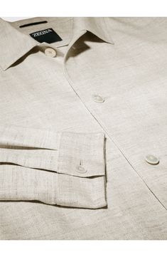 ZEGNA takes a clean-lined, minimalist approach to utility style on this chore jacket crafted of a wool-enriched silk-and-linen blend kissed with stretch. Front button closure Spread collar Long sleeves with button cuffs Front patch pockets Unlined 35% silk, 35% linen, 19% wool, 10% polyamide, 1% elastane Dry clean Made in Italy Men's Designer Clothing Timeless Linen Outerwear With Pockets, Elegant Relaxed Fit Outerwear With Buttons, Classic Linen Outerwear With Lapel Collar, Elegant Collared Outerwear With Relaxed Fit, Business Linen Button-up Outerwear, Linen Button-up Business Outerwear, Button-up Linen Outerwear For Business, Linen Button-up Outerwear For Business, Luxury Linen Workwear Outerwear