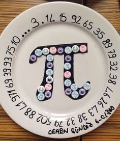 a plate with the letter pi on it