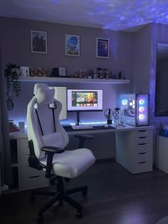 a chair that is sitting in front of a computer