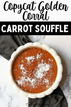 a bowl filled with carrot souffle covered in powdered sugar