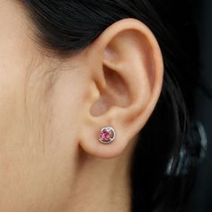 Product Details This Solitaire Earring is studded with a Round Shape Pink Tourmaline as Solitaire in Prong Setting. This Stud Earring is an ideal piece of Fine Jewelry for simple and subtle looks. Product Information SKU SHP-EARRINGS062194365 Length 8 mm Width 7.7 mm Weight 1.36 gm (Approximate) PINK TOURMALINE INFORMATION No.of Stones 2 Pieces Total Weight 0.90 Carat (Approximate) Dimension(approx) Round-5X5 mm-2 Pcs Color Pink Cut Brilliant Shape Round Setting Type Prong-Setting Quality Grade Solitaire Earrings, Solitaire Studs, Stud Earring, Pink Tourmaline, Prong Setting, Round Shape, Tourmaline, Fine Jewelry, White Gold