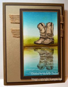 a handmade card with an image of a pair of boots on the edge of water