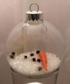 an ornament filled with ice and carrots