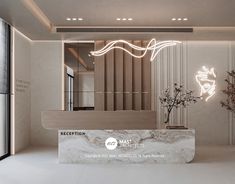 the reception desk is decorated with white marble