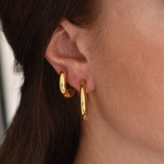 These beautiful and lightweight earrings are the ultimate trend for all seasons. Υou can easily combine them with all your jewelry. Perfect for everyday wear or as a gift! Available in 5 sizes. Are made from 18K gold filled over stainless steel. Sold in pairs. Product Details: * Made to order * 18K gold filled over stainless steel * Inner diameter : 8mm / 12mm / 14mm / 16mm / 20mm * Sold in pairs (2 units) * HYPOALLERGENIC * NICKEL and LEAD FREE * ANTI-TARNISH Measurements: * 1: - 14mm diameter Thick Gold Hoop Earrings, Hoop Earrings Chunky, Gold Huggie Hoop Earrings, Thick Gold Hoops, Earrings Gold Hoops, Chunky Gold Hoop Earrings, Hoop Earrings Gold, Greek Jewelry, Protection Necklace