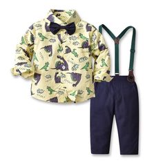 Introducing our roaringly adorable Dinosaur Print Suspender Boys Outfit! This trendy and charming ensemble is designed to make your little boy stand out in style and comfort. The highlight of this outfit is the Dinosaur Print Long Sleeve Shirt, featuring a playful and eye-catching dinosaur pattern that is sure to captivate your little one's imagination. The long sleeves provide warmth and protection, making it perfect for all seasons. To add a touch of sophistication, we've included a dapper Bow Suspenders Boys Outfit, Dinosaur Shirts, Clothing Vendors, Tie Cardigan, Party Models, Dinosaur Shirt, Boy Clothing, Blue Pants, Navy Pants