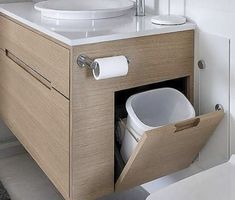 a bathroom with a sink and toilet in it