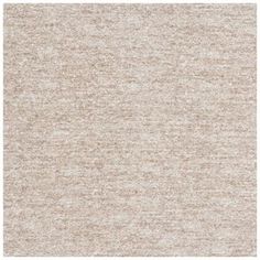 an area rug with white and beige colors