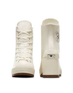 Converse Chuck Taylor 70s Deluxe heeled sneakers in white | ASOS White Low-top Platform Boots, White High Ankle Sporty Sneakers, Modern White Boots For Streetwear, Casual White Boots With Rubber Heel Cap, Modern White Converse High-top Sneakers, Modern White High-top Boots, White Sporty Platform Boots, White Low-top Boots With Rubber Sole, White High-top Boots With Reinforced Heel