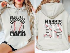 Custom Baseball Mama Hoodie, Baseball Name and Number Hoodie, Baseball Season Hoodie, Baseball Hoodie, Game Day Hoodie 💖Youth Hoodies do not have drawcord for added safety!💖 Material: 50% cotton, 50% polyester for a comfortable and durable blend. Fabric: Medium-heavy (8.0 oz/yd² or 271.25 g/m²) for warmth on cooler days. Fit: Loose fit for comfort without sacrificing style. Label: Sewn-in for a seamless feel. Sizing: Check our sizing chart for the right fit. HOW TO PLACE YOUR ORDER Review prod White Hoodie For Sports Events During Baseball Season, Baseball Season Sports Hoodie, White Hoodie With Letter Print For Baseball Season, Hooded Hoodie For Baseball Season, Hooded Sweatshirt For Baseball Season, Mama Hoodie, Baseball Hoodie, Baseball Mama, Baseball Season