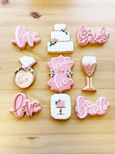 decorated cookies with the words bride and groom on them are arranged in different shapes, sizes, and colors