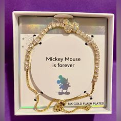 Disney's Mickey Mouse 14k Gold Flash Plated Cubic Zirconia Tennis Bolo Bracelet * Length: 9.75 In. * Clasp: Slider * Nickel Free * Metal: Brass * Plating: 14k Gold Flash Plated * Finish: Polished * Packaging: Boxed * Imported Stone Details * Stone Type: Cubic Zirconia * 1.1 Mm * Shape: Round * Setting: Prong Disney Gold, Bolo Bracelet, Disney Jewelry, Disney Mickey Mouse, Womens Jewelry Bracelets, Cubic Zirconia, Tennis, Flash, Plating