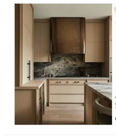 a kitchen with wooden cabinets and marble counter tops is featured in an ad for google