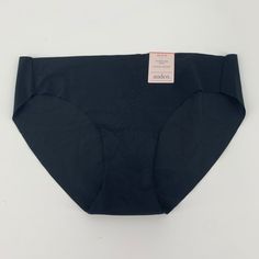 With A Bikini Cut And Low-Rise Fit, This Seamless Underwear Provides Ample Coverage And Security, While Still Remaining Smooth Beneath Your Clothes With The Help Of An Invisible-Edge Design. 100% Cotton Lining Further Contributes To Your Comfort, Helping You Conquer The Day With Confidence And A Sleek, Seamless Look. Material: 77% Nylon, 23% Spandex Lining Fabric: Jersey Material Lining: 100% Cotton Rise: Low Rise Garment Details: Invisible Edge Care And Cleaning: Machine Wash & Tumble Dry Size: Black Fitted Seamless Bottoms, Fitted Black Bottoms With Seamless Design, Black Seamless Shapewear Swimwear, Black Shaping Full Coverage Swimwear, Black Seamless Shaping Swimwear, Black Seamless Full Coverage Shapewear, Black Full Coverage Seamless Shapewear, Elegant Black Seamless Swimwear, High Stretch Black Swimwear With Full Coverage