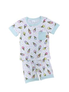 Sweet dreams are made of our Ice Cream All Night Girls Short Sleeve Pajama Set! Featuring a delightful ice cream cone pattern on a crisp white background with mint green trim, this set is both fun and stylish. Made from soft, breathable fabric, it ensures a cozy and comfortable sleep. Perfect for your little one's sweetest nights. And be sure to check out our other must have new arrivals. INCLUDES: 2 Piece Pajama Set FIT: This item is true to size FABRIC & CARE: Cotton/poly blend Machine washabl Playful White Cotton Sleepwear, Fun Green Cotton Set, Sweet Summer Sleepwear, Cute Green Cotton Sleepwear, Playful White Summer Sleepwear, White Summer Sleepover Set, Playful White Sleepwear, Playful Bedtime Sets For Spring, Green Cotton Sleepover Sets