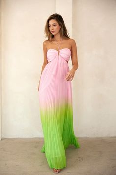 You will be stealing all the looks in The Harriet Maxi Dress. Detailing a sweetheart halter neckline, side cutouts and a back elastic band all in a stunning pink and green pleated design. Pair this beauty with heels and the perfect clutch for a night out with your guy! Details + Fit: 100% Polyester Runs True to Size Hand Wash Cold Hang Dry Sweetheart Halter Neckline Sleeveless Back Elastic Band Side Cutouts Lined Pleated Design Pink | Green | Solid Model is 5'8" and wearing a size Small Green Halter Dress For Summer Prom, Pink Summer Halter Dress For Prom, Pink Halter Dress For Summer Prom, Green Halter Neck Dress For Date Night, Pink Pleated Vacation Dress, Green Halter Neck Cocktail Dress, Pink Backless Halter Dress For Prom, Flirty Spring Halter Dress For Prom, Flirty Halter Dress For Prom In Spring