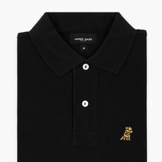 Our versatile classic polos are made with 100% Pima cotton. They are perfect as an office attire or leisurewear providing you a sophisticated look. Made in Peru100% Pima CottonGold Embroidered James Bark LogoRibbed Finishes Black Cotton Polo Collar Shirt, Formal Black Cotton Top, Classic Fitted Polo Shirt For Workwear, Black Cotton Semi-formal Shirt, Semi-formal Black Cotton Shirt, Classic Business Polo Shirt With Polo Collar, Classic Polo Shirt With Polo Collar For Business, Classic Black Shirt With Spread Collar, Classic Polo Shirt With Spread Collar For Work