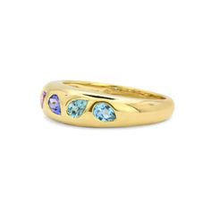 Add a pop of color to your jewelry collection with our Mosaic 18K Gemstone Gypsy Ring! This unique and playful ring features multi-colored pear cut gemstones set in a mosaic design on an 18K gold band. Perfect for stacking or making a statement on its own, this ring adds 0.97 ct of gemstone elegance to any outfit. Yellow Gold Multi-stone Teardrop Rings, Gold Teardrop Multi-stone Ring, Reversible Ring, Mosaic Design, Mosaic Designs, Blue Zircon, Gold Price, Pinky Ring, Pear Cut