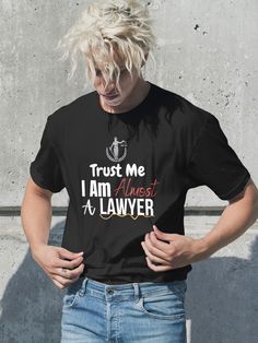 Make a Statement with our Beautiful and Retro Unisex Sunset Lawyer T-shirt "Trust Me I Am Almost a Lawyer" This Vintage looking shirt is the best gift, Could be a perfect Tshirt gift for Dad, Mom, Sister, Brother, and Friends this Christmas. Enjoy the Winter in Style wearing this beautiful graphical Tee. Looking for unique T-shirts? Check out our Christmas Lawyer  Shirt, It could very suitable gift for Graduation, Birthday, or New Year Gift. Attorney Shirts Counselor Shirt Legal Shirts Judge shi Gift For Lawyer, Funny Lawyer, Lawyer Gifts, Law Student, Grad Gifts, Looks Vintage, Unique Tshirts, New Year Gifts, Trust Me