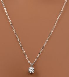 Minimalist Cubic Zirconia Single Diamond Necklace, Formal Sterling Silver Diamond-shaped Necklace, Silver Cubic Zirconia Diamond-shaped Necklace, Nickel-free Silver Cubic Zirconia Necklace, Nickel-free Cubic Zirconia Pendant Necklace, Simple Elegant Necklace, Elegant Necklace, Elegant Necklaces, Sterling Silver Chains