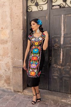 -This Beautiful Long Mexican Colorful Floral Dress is the perfect dress for a fun night out or a special event.  -It is full of colorful embroidered flowers and has some crocheted details.  -This dress has ties on the back in order to adjust the fit. - You can purchase the belt here: https://www.etsy.com/us-es/listing/690070823/fajo-artesanal-mexicano-accesorios-para?click_key=e500d3e22948cdd05288af7791860e746941765c%3A690070823&click_sum=e1baaff8&ref=shop_home_active_3&pro=1&frs=1&sts=1 Available size: S - 2X. Please note: The accesories shown with this dress may purchased as well and Can be found in this links. Earrings:https://www.etsy.com/es/listing/855938626/aretes-mexicanos-de-filigrana-aretes?ref=shop_home_active_16&pro=1&frs=1 Shoes:https://www.etsy.com/es/listing/786486059/tacon-a Knee-length Dresses With Multicolor Embroidery, Multicolor Embroidery Short Sleeve Party Dresses, Fitted Multicolor Floral Embroidered Midi Dress, Fitted Multicolor Midi Dress With Floral Embroidery, Short Sleeve Embroidered Dress For Party, Multicolor Embroidered Short Sleeve Dress For Party, Party Dress With Multicolor Embroidery And Short Sleeves, Short Sleeve Embroidered Dress With Multicolor Embroidery For Party, Fitted Sleeveless Dress With Multicolor Embroidery