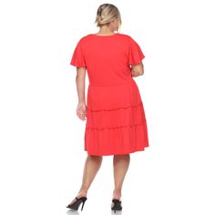 Our flouncy tiered design gives this midi dress a simple but elegant look. The easy, breezy style is what makes if a perfect casual wear on hot days. The loose fit will compliment and flatter all body types. It features a V-neckline, a faux button down front and flutter sleeves. -Care Instructions: Machine Wash Cold -Material: 96% Polyester, 4% Spandex Product Specifications: -V-Neck -Tiered -Short Dress Breezy Style, Tiered Midi Dress, Easy Breezy, Hot Days, Flutter Sleeves, Dress Materials, Short Dress, Flutter Sleeve, Body Types