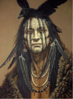 an image of a native american man with feathers on his head and eyes painted white