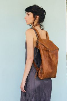 This stunning backpack is made of genuine soft nappa leather in a Honey Brown color. With enough room for all your daily essentials, It is perfect for everyday use, as well as for laptops of most sizes,  IPAD, A4 files, books and travel. it as a unique structured  with a zipper closer at the top, and two sides zipper pockets for mobile, keys, etc. It is fully lined with black strong cotton fabric which I divide to two large interior, zip pocket, and a leather cell phone pocket, shoulder strap is Leather Backpack With Large Capacity For On-the-go, Soft Leather Softback Backpack For School, Leather Travel Soft Backpack, Leather Travel Bag With Softback, Leather Travel Bag With Softback Design, Leather Travel Shoulder Bag With Softback, Soft Leather Standard Backpack For School, Leather Softback Backpack For Travel, Soft Leather Backpack For School