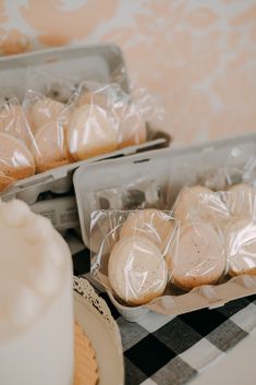 some cookies are wrapped in plastic and sitting on a table