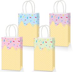 three bags with donuts and sprinkles on them